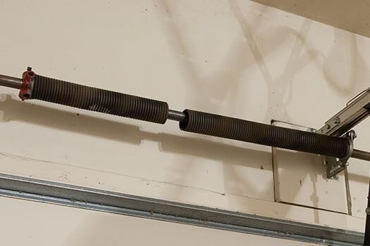 Expert garage door opener installation and broken spring repairs.